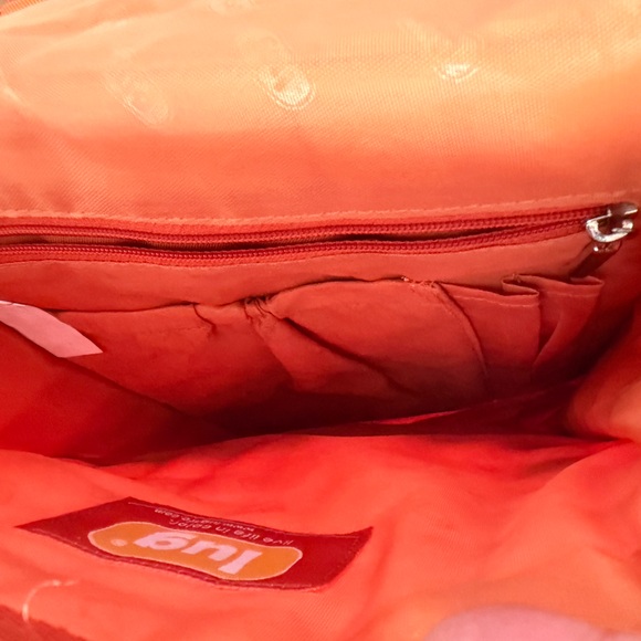 Lug Quilted Orange Crossbody Organizer Bag. Interior & exterior pockets. - Picture 8 of 10